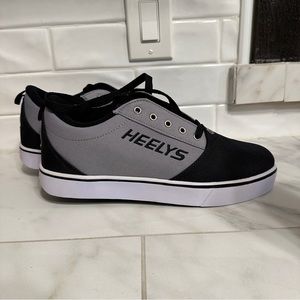 Men’s Heelys size 11, Black and gray NEVER BEEN WORN